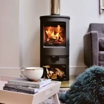 Wood heater in room by Cradle Mountain Fireplaces